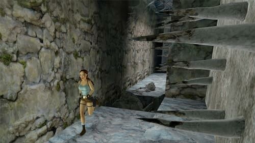 Adventurer running through a stone corridor with spikes.