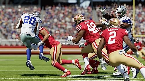 Football players in action during a game.