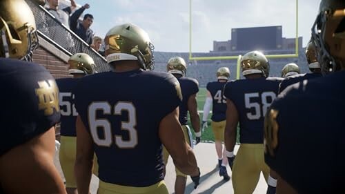 Football team in uniforms entering a stadium field