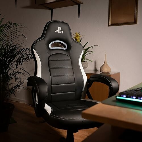 Black and white gaming chair in a home office setting