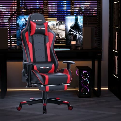 GTRACING Gaming Chair in front of a computer setup with LED lights