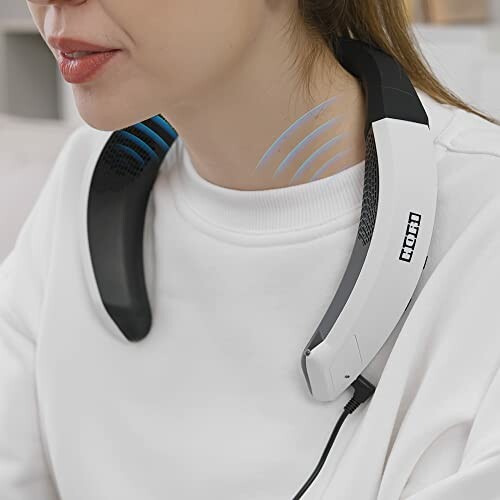 Person wearing a neck speaker